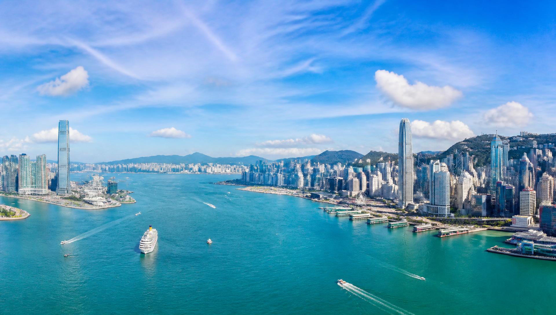 Hong Kong skyline over Victoria Harbour in daylight